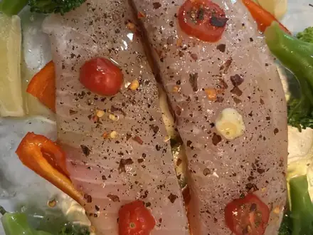 Минтай в духовке с овощами